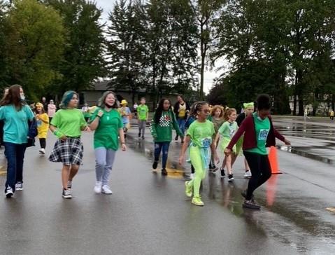 5th Grade Students at a rainy Fun Run